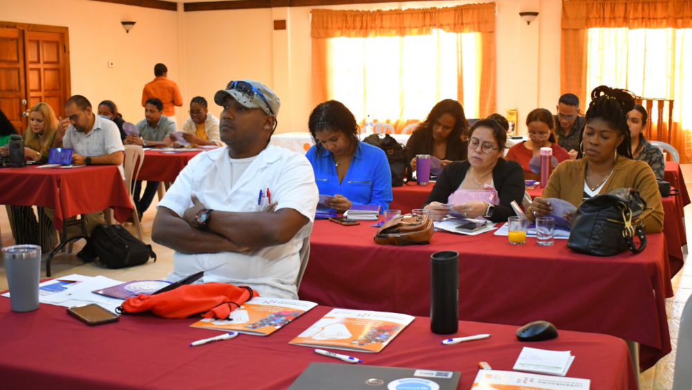 Participants listening in the training session