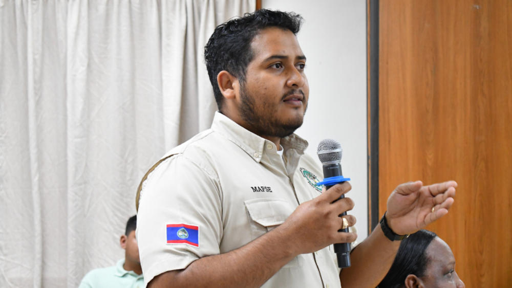 A representative from the Ministry of Agriculture, Food Security, and Enterprise explains data collection processes and interdepartmental data sharing.