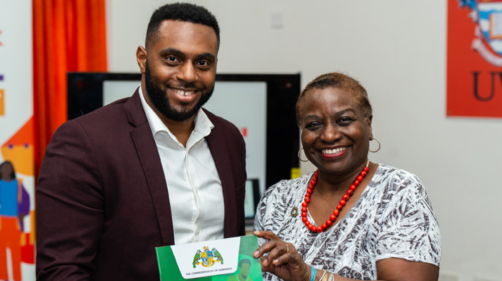  Dr. Natalia Kanem, Executive Director of the United Nations Population Fund (UNFPA) with a youth representative at the  Intergenerational Dialogue in Dominica