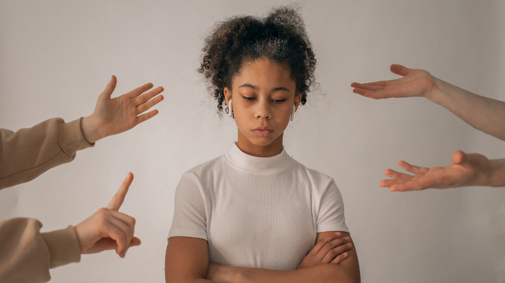 Adolescent girl experiencing criticism 