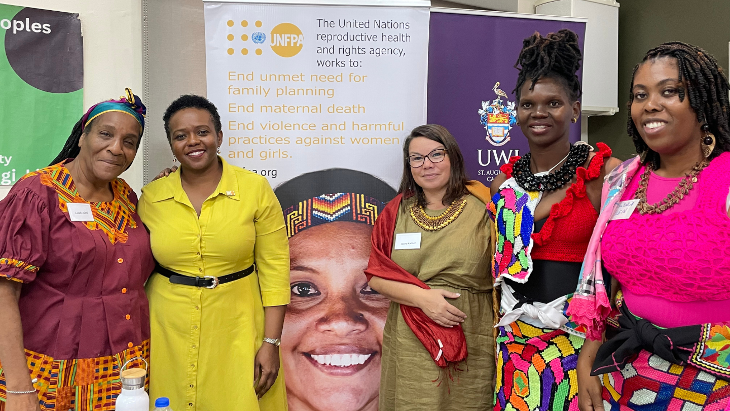 Ms. Tisa Grant, Liaison Officer, Sub-Regional Office for the Caribbean, Liaison Office in Trinidad and Jenny Karlsen, UNFPA Deputy Director with members of the Indigenous and Maroon community