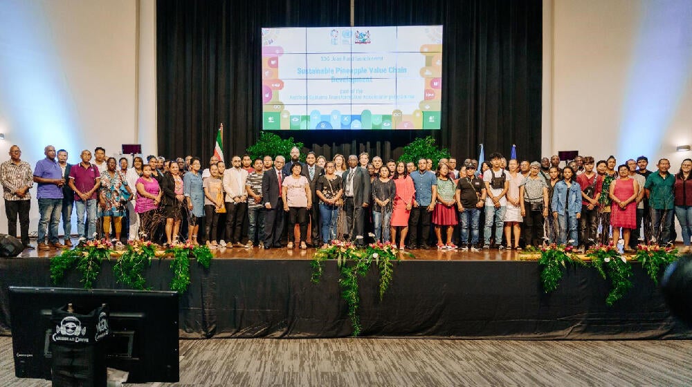 Participants all standing on an elevated platform