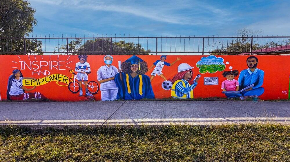 Finished mural in Belize with the goal of providing empowerment and encouraging the prevention of Gender based Violence (GBV)